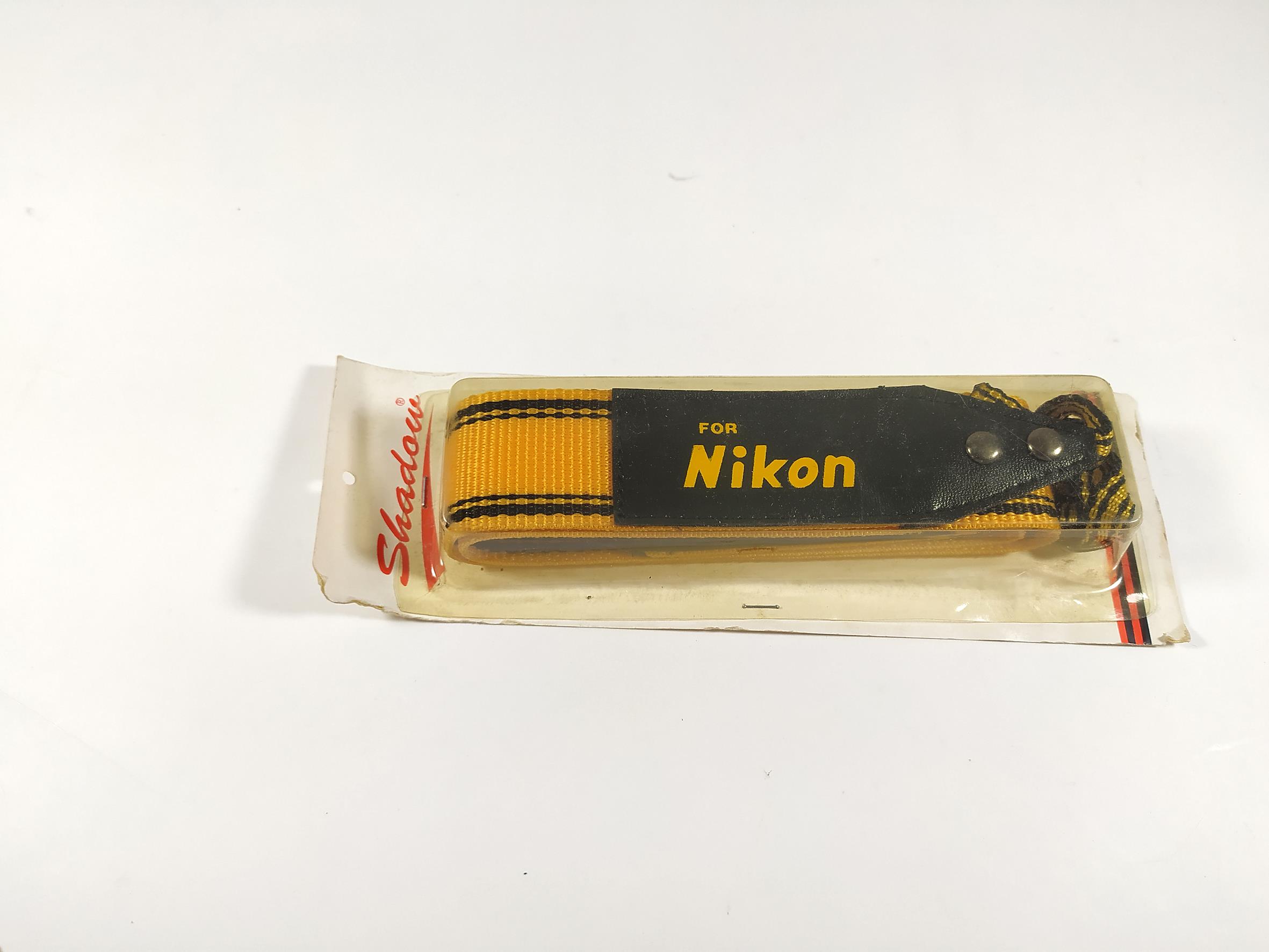 بند آکبند زرد دوربین عکاسی مارک Nikon